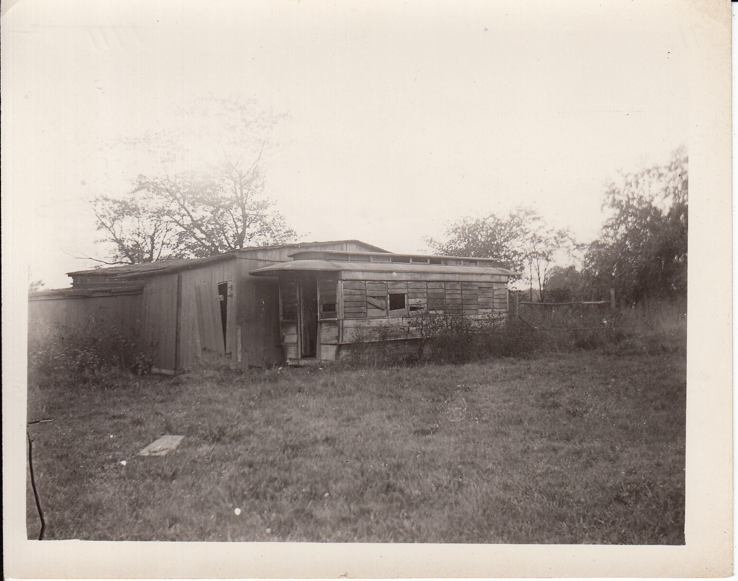 Building and railroad locomotive at Menlo Park site.