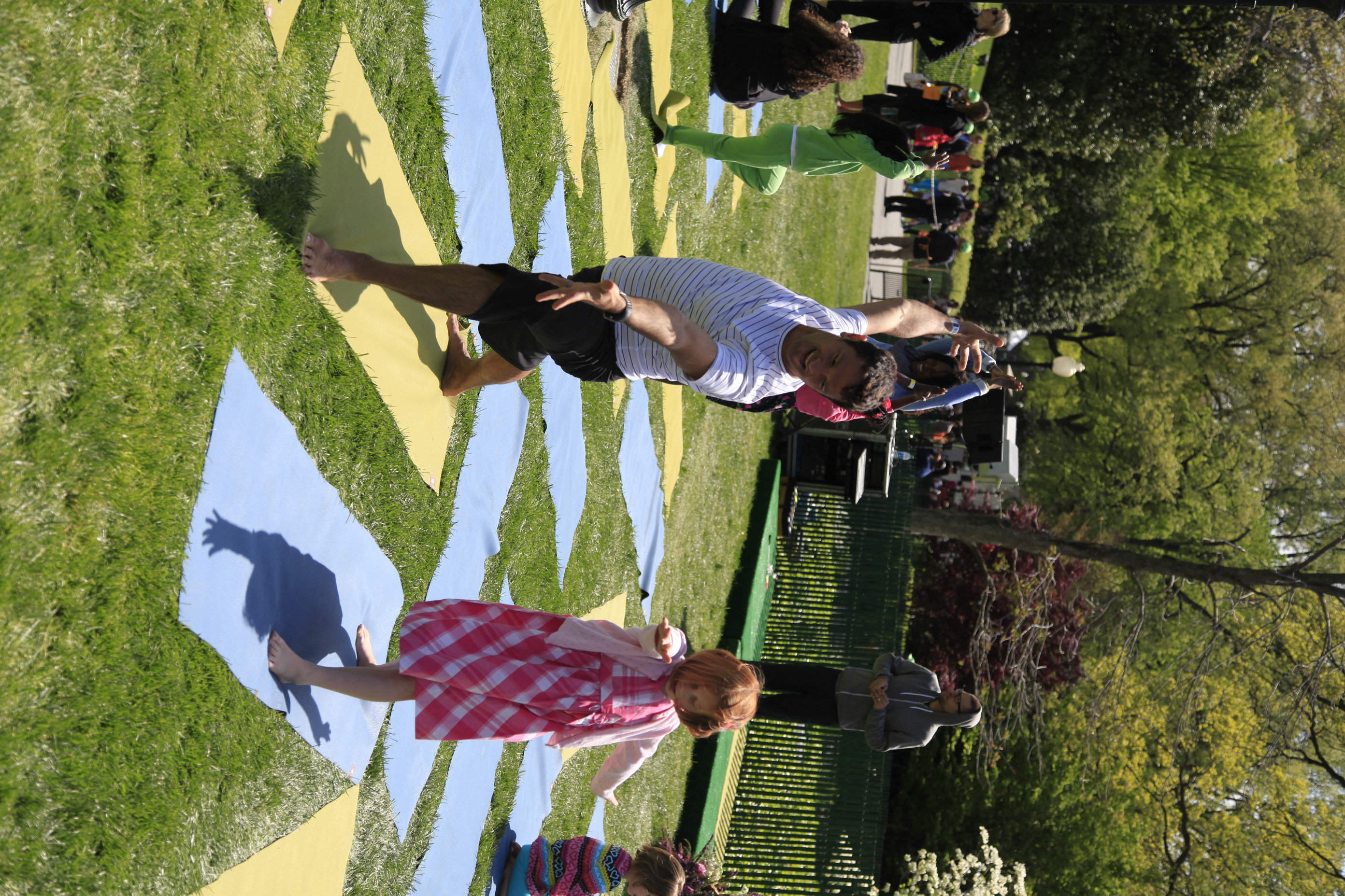 Children learn yoga poses at the 2012 Easter Egg Roll.