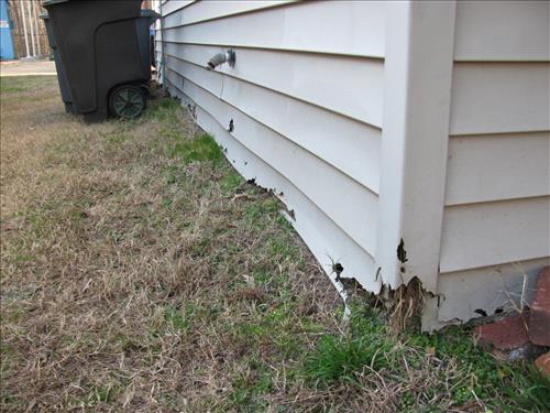 Damaged siding on maintenance shop at Richmond National Battlefield Park in January 2012