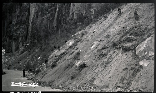 Workers engaged in bank stabilization above the Zion Mt Carmel Highway.