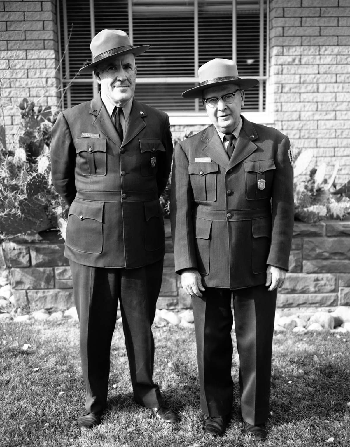Rudy Lueck (left) and Chief Park Naturalist Carl E. Jepson at time of their retirement, outside of Mission 66 Visitor Center and Museum and headquarters.