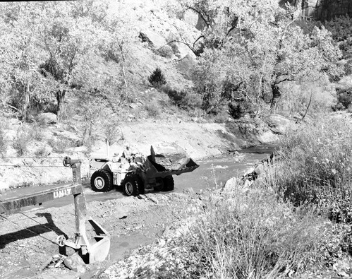 Of river bank protection, Virgin River, with equipment (front end loader and dredge).