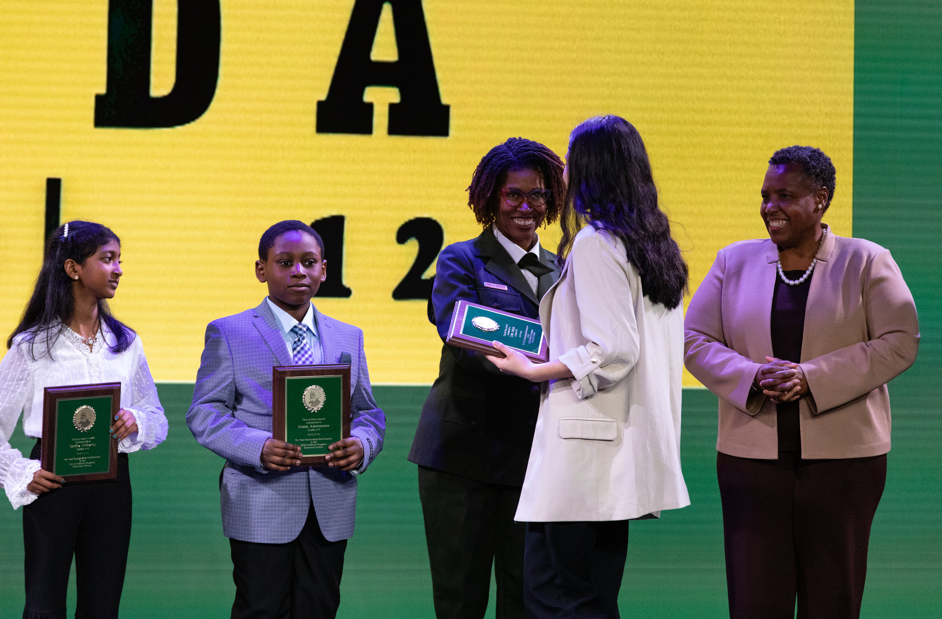 A young women accepts an award