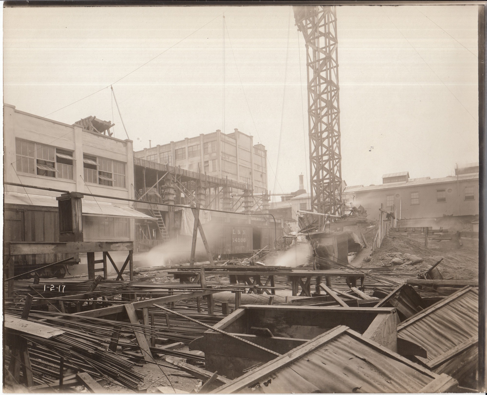 Construction of second half of Building 21 viewed from yard, second floor construction.
