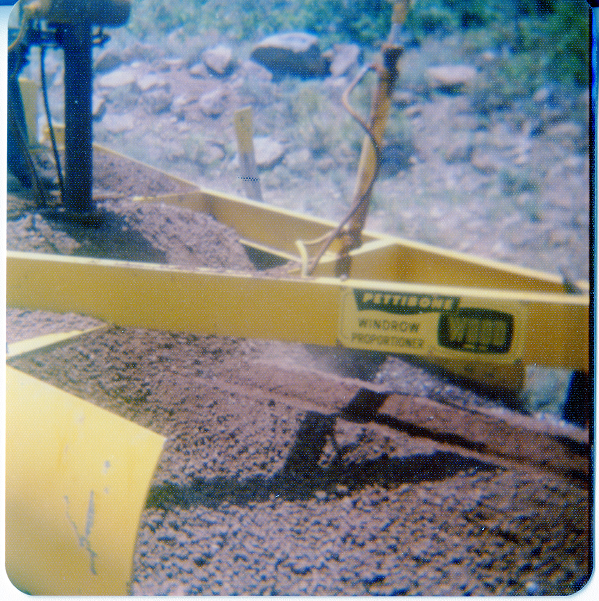 Close up of construction vehicle performing road work along the Kolob Terrace Road.
