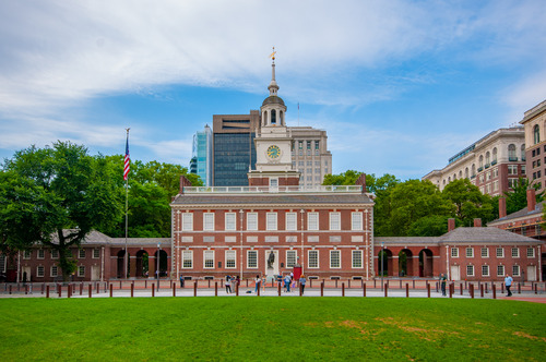 A view of the north side of Independence Hall, showing the main building in the center with the east and west wings on the sides.  