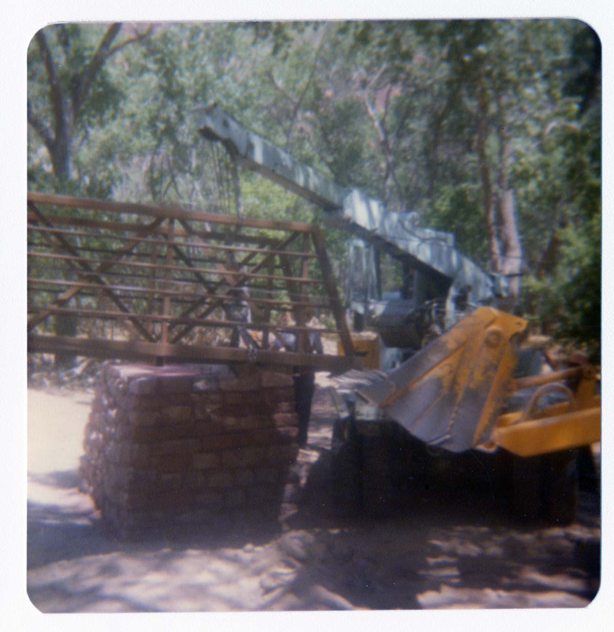 Construction vehicle working during the emplacement of the new Zion Lodge footbridge.