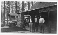 Manzanita Lodge Employees on Porch. Administrative Collections: Album 5 (Emergency Conservation Works) -Right to left: Manzanita Lake concessioners (and LAVO Rangers) Charles Keathley and Don Hummel, and third man in front of Manzanita Lake Lodge.