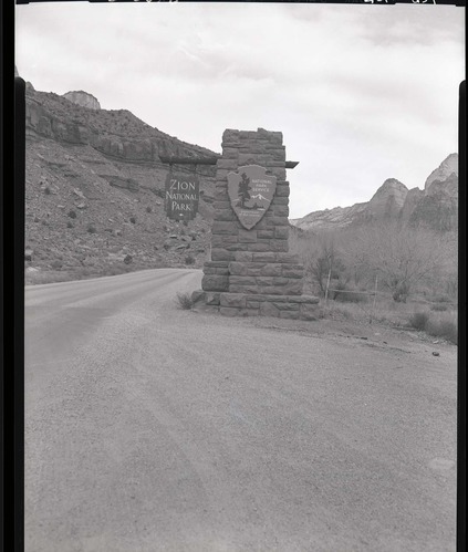 Entrance sign at south entrance and plans for alteration of sign to conform with regulations.