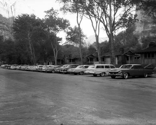 Visitor use, Zion Lodge - parked cars at cabin area of lodge, 7:30 a.m., September 3, 1961, Labor Day Weekend.