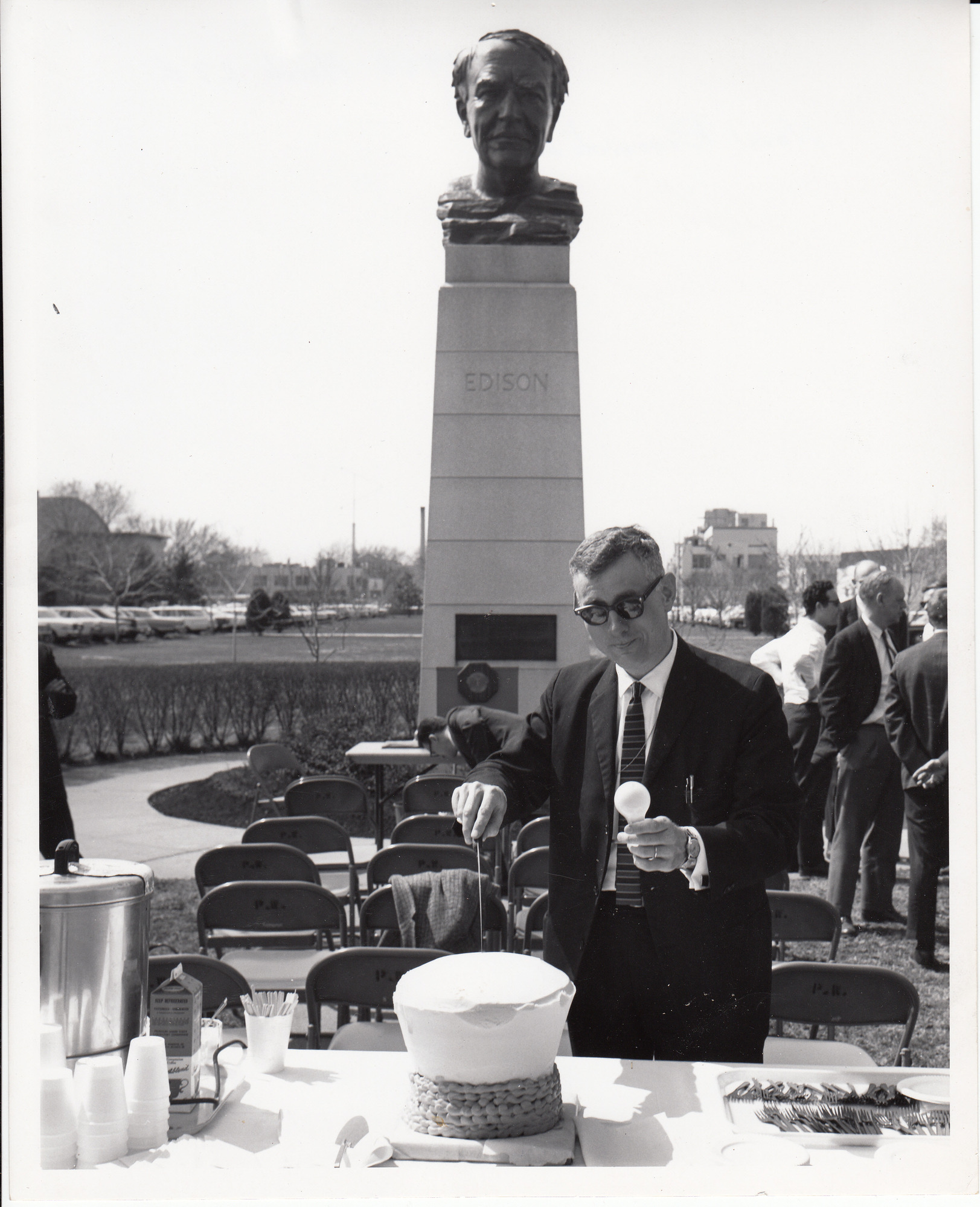 The Thomas Edison Toastmaster Club at the Naval Research Laboratory. Bust in Thomas Edison's likeness in background sculpted by Evelyn Beatrice Longman.