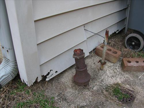Damaged siding on maintenance shop at Richmond National Battlefield Park in January 2012