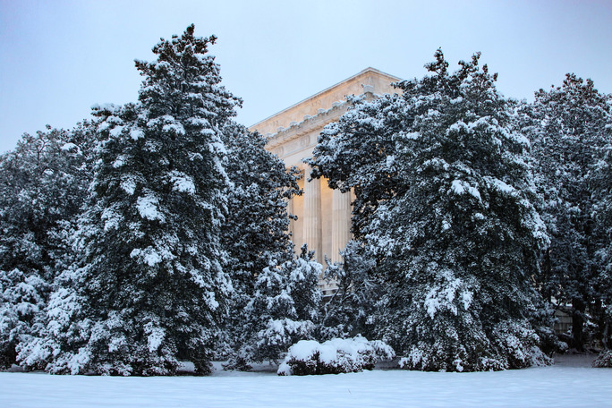 Lincoln Memorial behind snow-covered trees