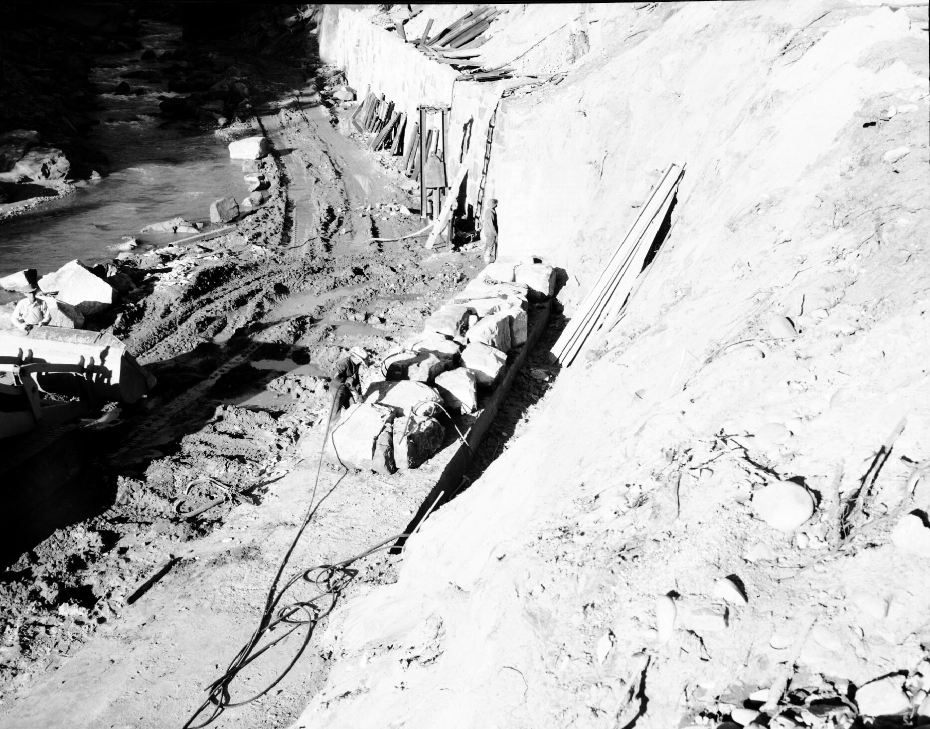 River revetment repair about a half mile south of the Court of the Patriarchs. Flood damage by use of piling and restoration of rock wall.
