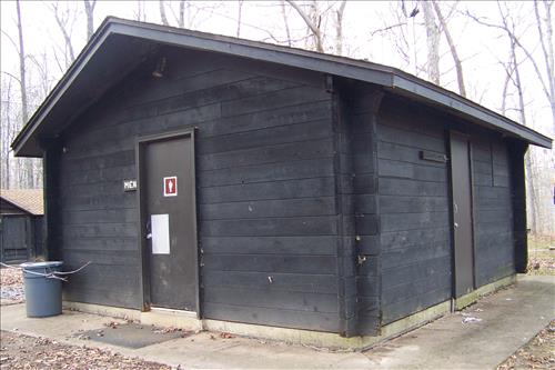 Paint and stain exterior of historic structures in camp 3 and camp 5 at Prince William Forest Park April 2012.