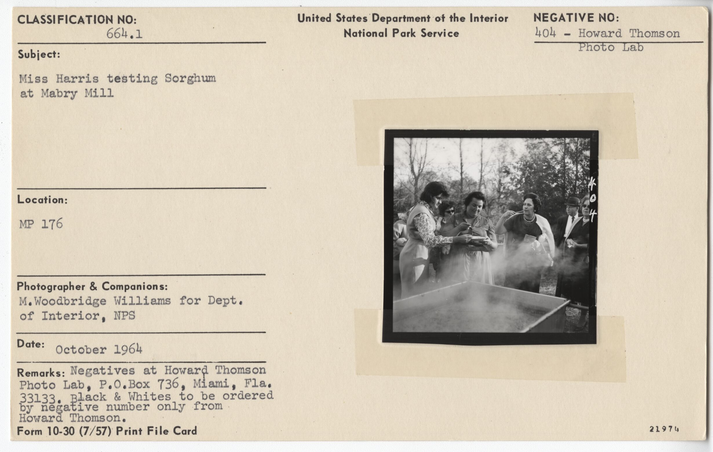 Miss Harris testing sorghum at Mabry Mill