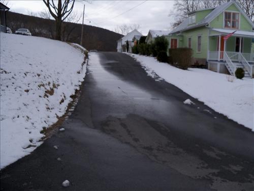 Views of the gravel roads and parking areas relaid by the project in 2011 at the HAFE Park Grandview School and Lancaster Street.