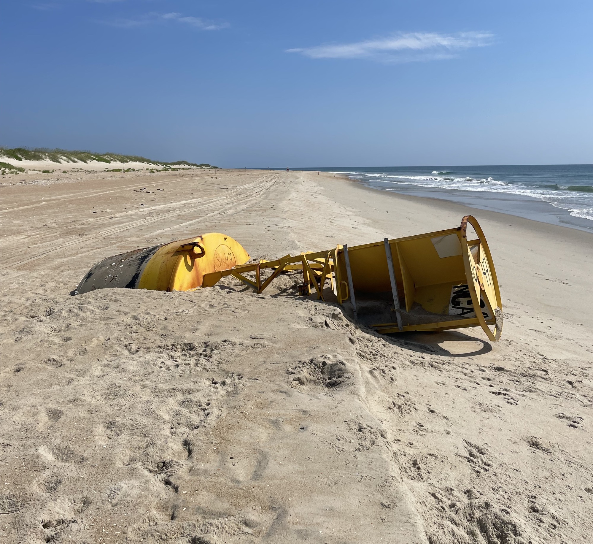 Coast Guard buoy located north of Ramp 34. The Coast Guard, with aerial support from the Marines Corps, removed the buoy in June 2025.