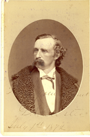 General George Armstrong Custer Wearing a Fur-Collared Coat. LIBI_00019_00283; This item is an original albumen cabinet card (card-mounted photograph) of General George A. Custer in bust view and dressed in civilian clothes.  The oval-shaped photograph is 4 1/2 x 6 3/8