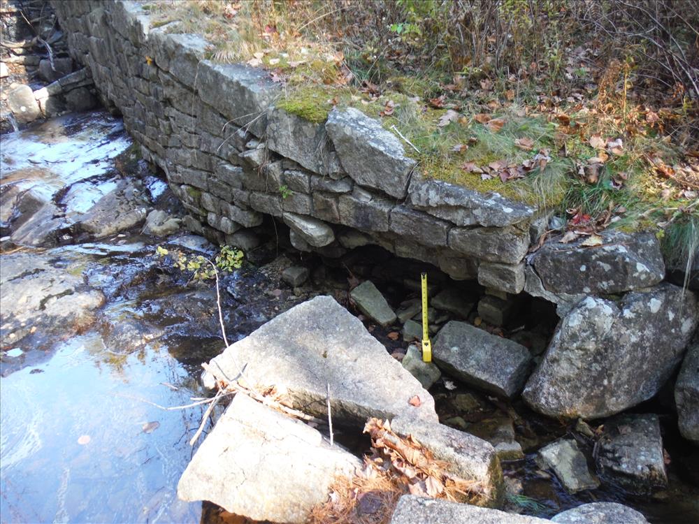 Mill Field Reservoir Spillway. Failing stone wall in the spillway outlet. 2013