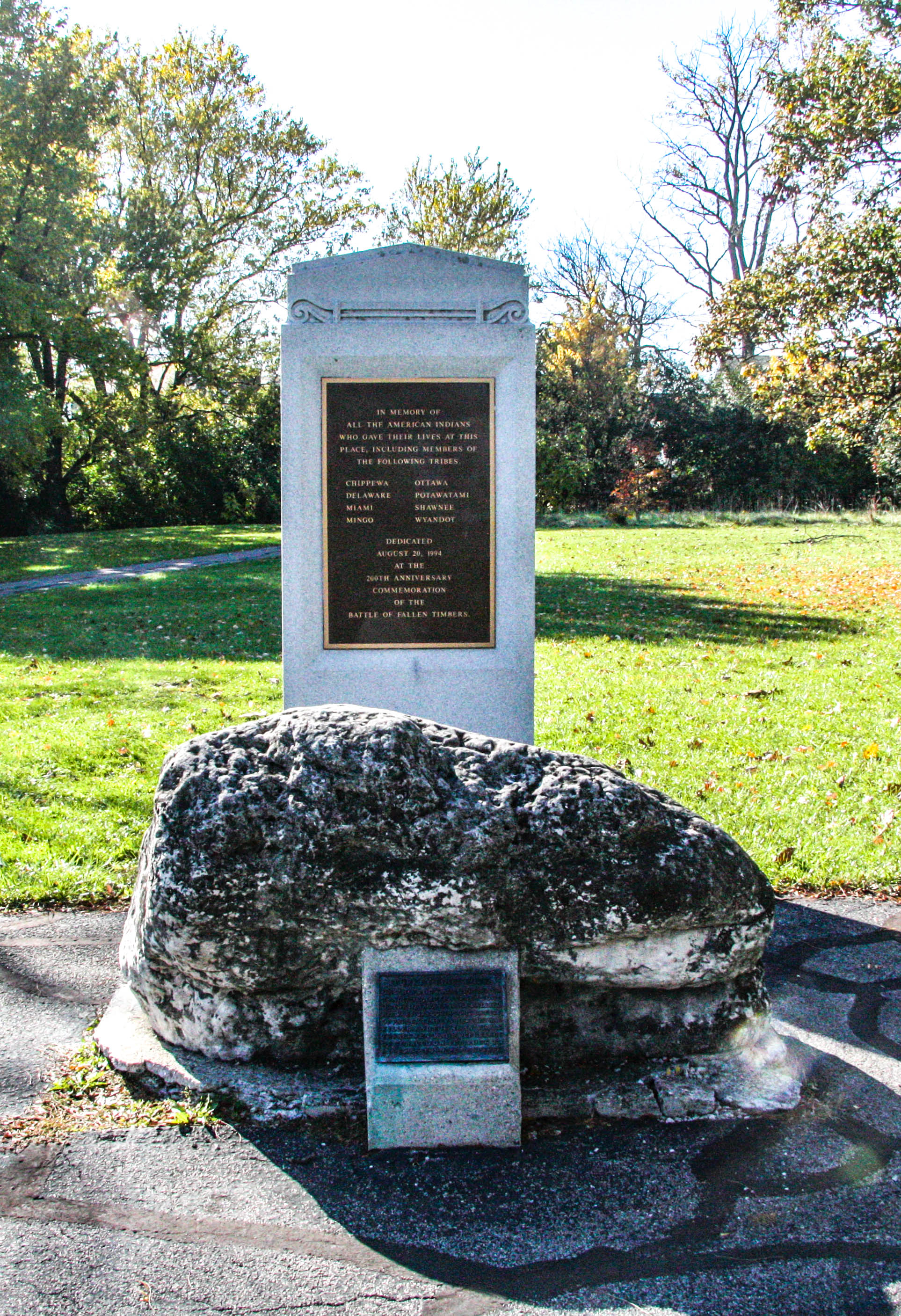 Monument and boulder with a plaque known as the "Turkey Foot Rock"