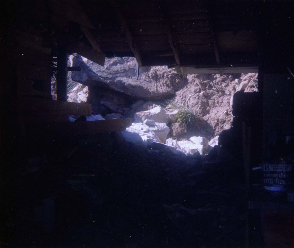 Color photo of rock slide in maintenance yard.