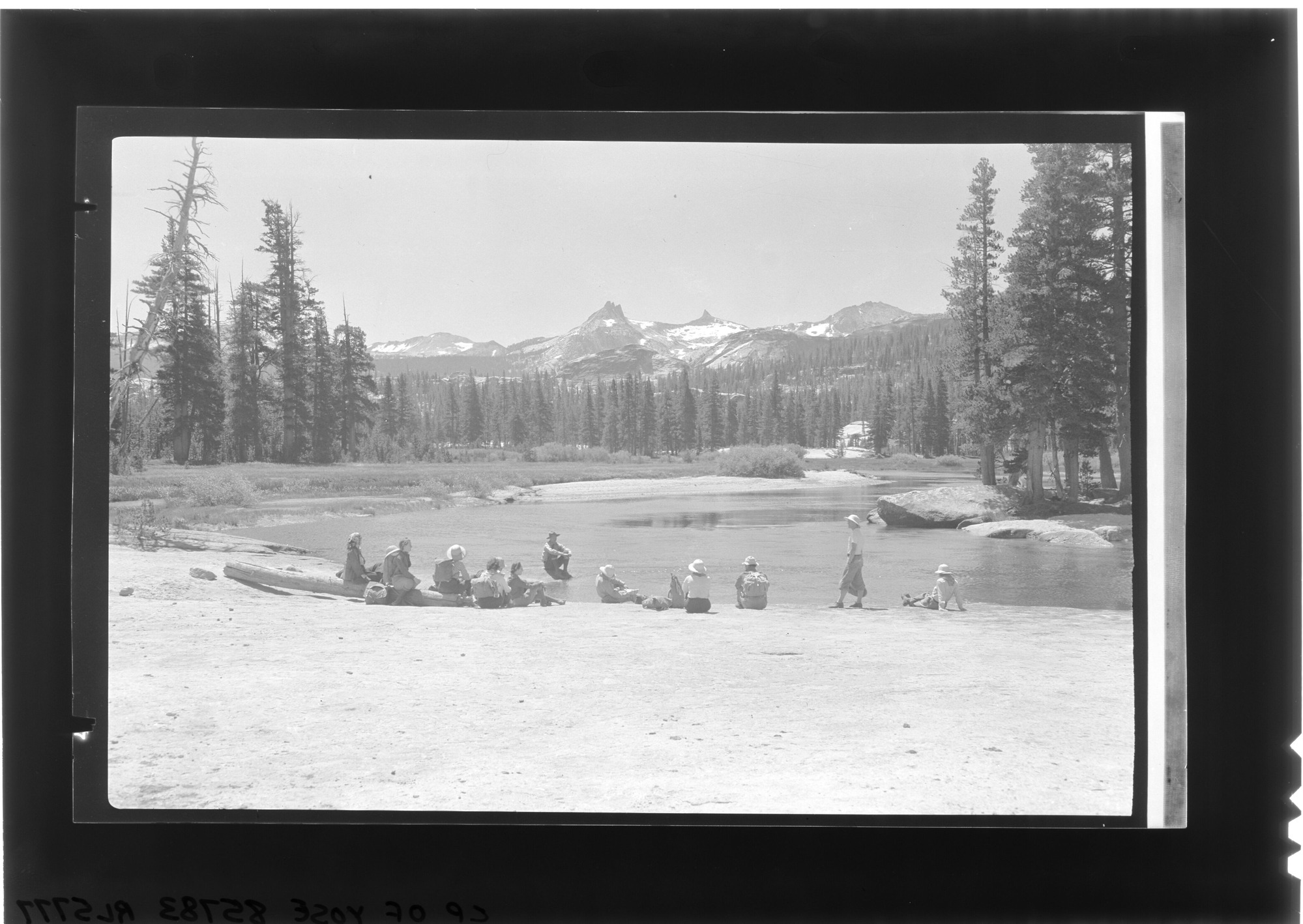Ranger-naturalist and group along the Tuolumne River.