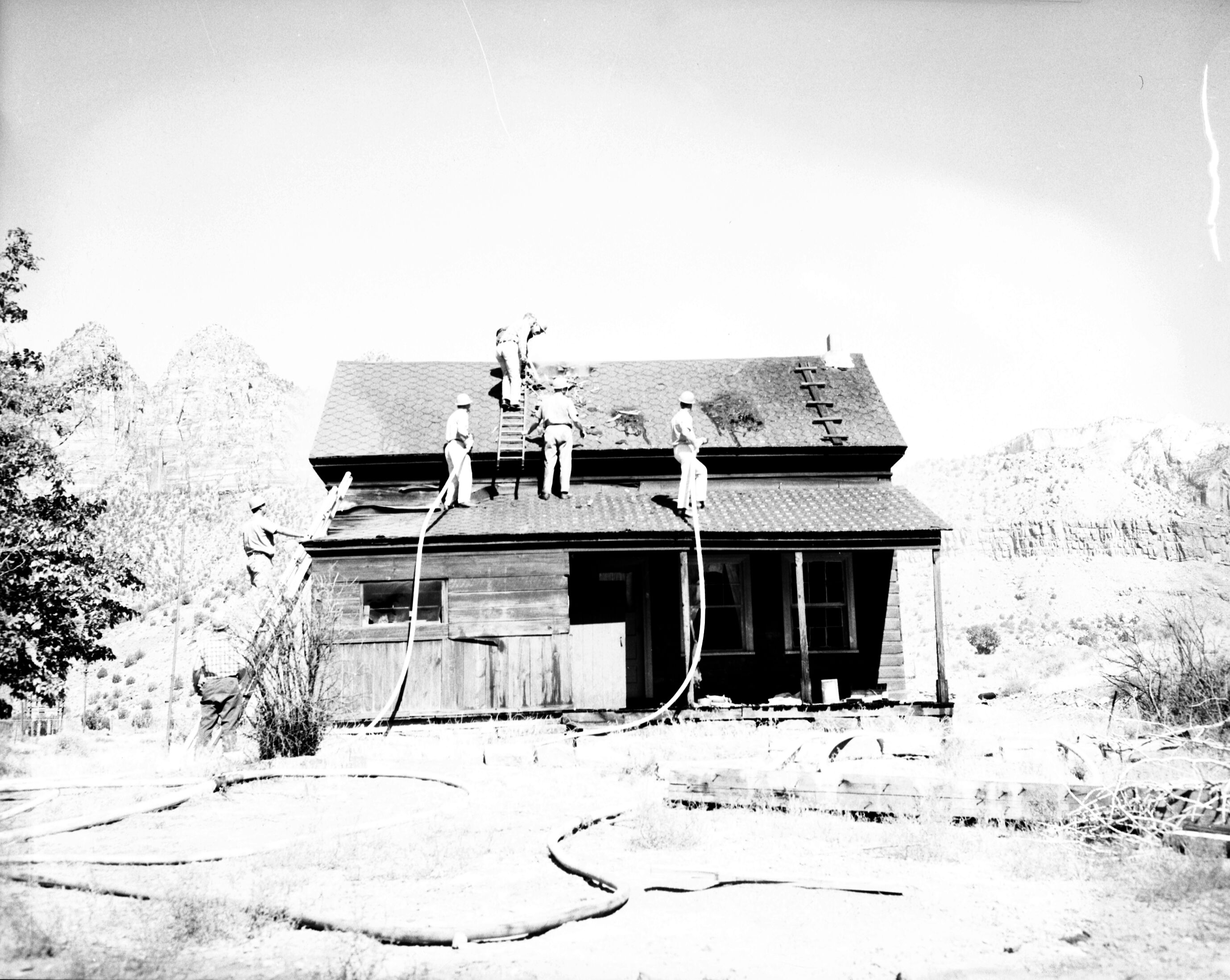 Fire prevention training; demonstration for students of Springdale school. Burning of old Justet home adjacent to Springdale school.