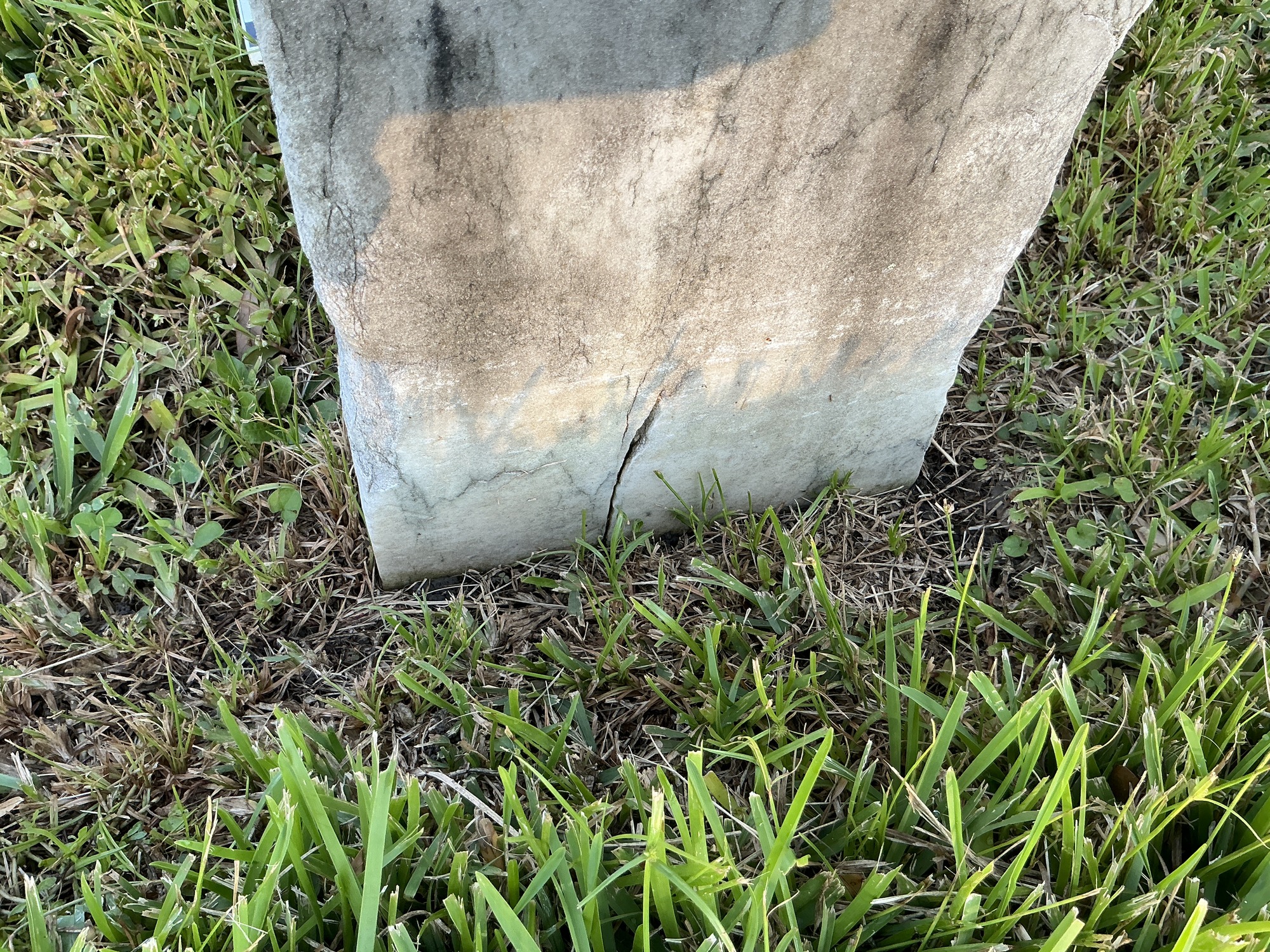 Extra image of historic upright marble headstone with recessed shield face.