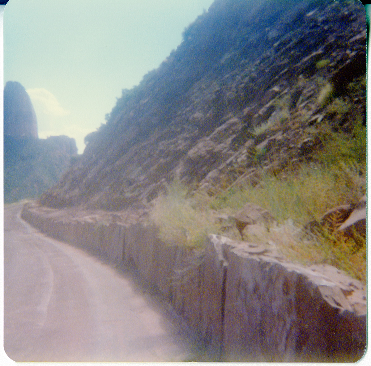 Side retaining wall and landscape while driving along the Kolob Terrace Road - North Unit.