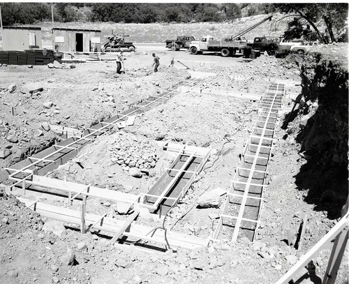 Building forms for footings of basement walls at Mission 66 Visitor Center and Museum construction.