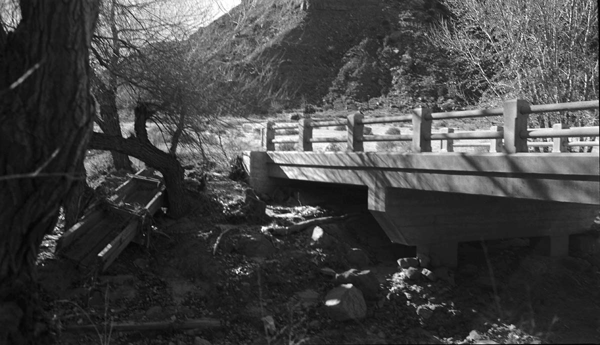 Damage to irrigation flume at the Oak Creek bridge. Flood of September 1940. Looking south.