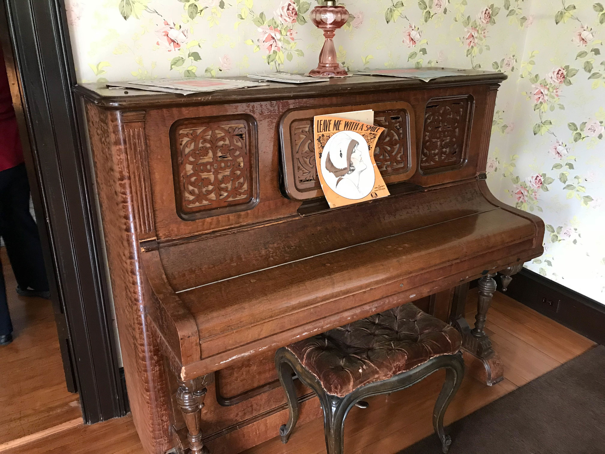 Wooden piano and seat