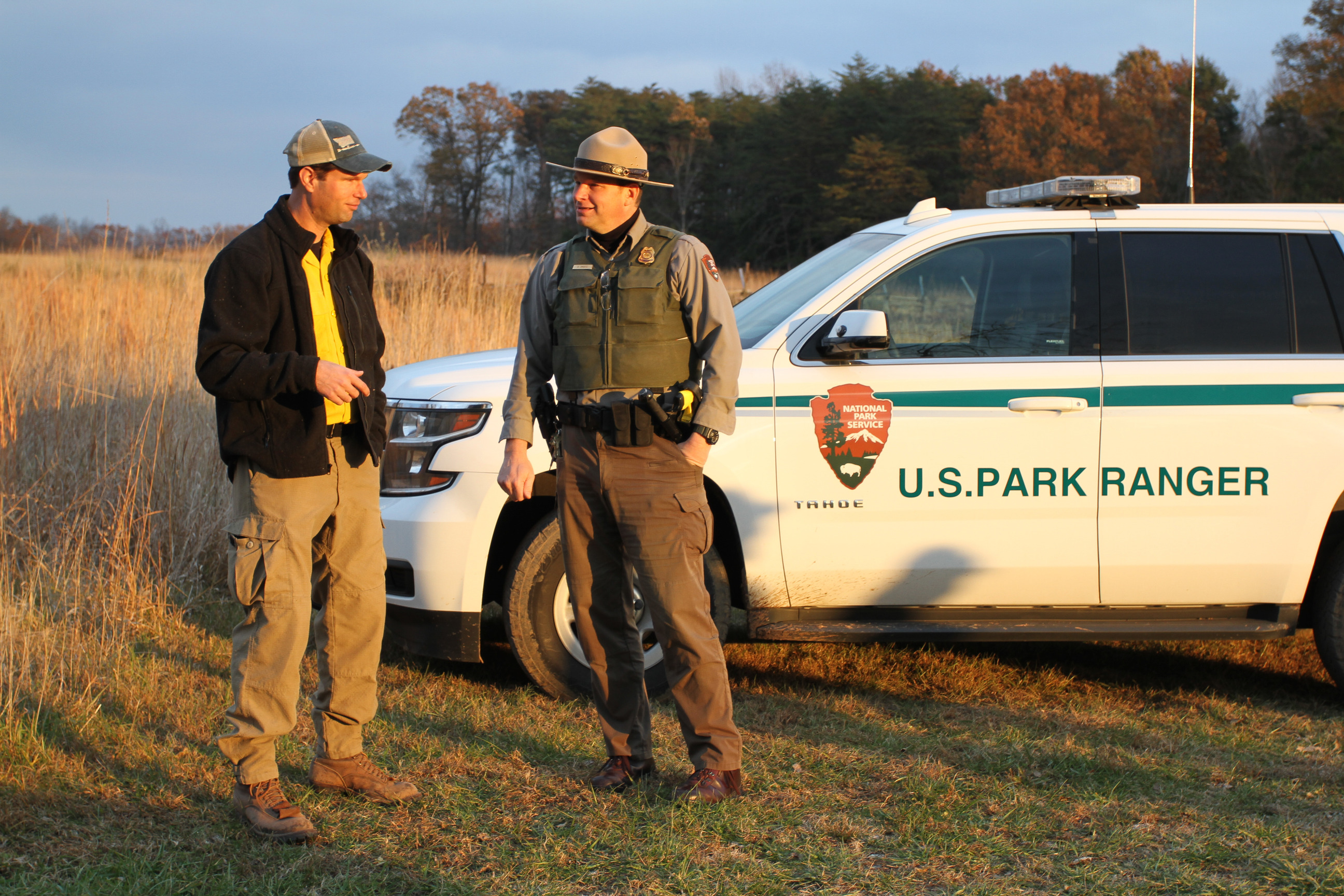 Wildland firefighters use drip torches and tools manage prescribed fire near Brawner Farm at Manassas National Battlefield Park. 