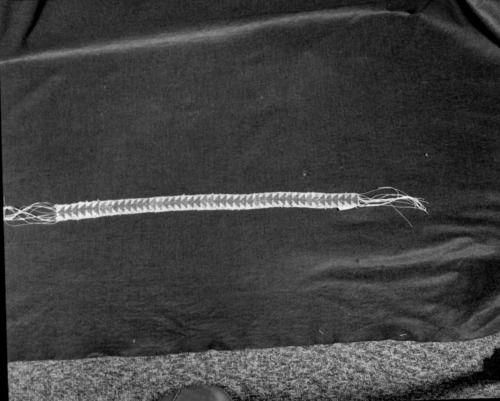 Marie Rozier Collection, Catalog No. 138. Object: Miwok beaded headband. Dimensions: 21 1/2 x 1 1/4". Materials: Faceted red, green and clear beads; cotton string. Technology: Loomless beadwork technique, double weft. Collection History: Made by Mrs. Fuentes, 1950s. Purchased from Mrs. Fuentes. Photographed by Michael Dixon in December 1982. Catalogued by Craig Bates and Barbara Beroza. Yosemite Collections, National Park Service.