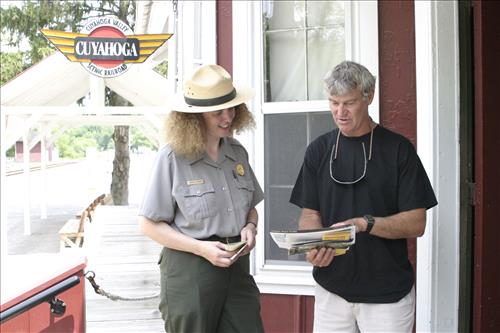 Ranger With Visitors Outside Peninsula Depot