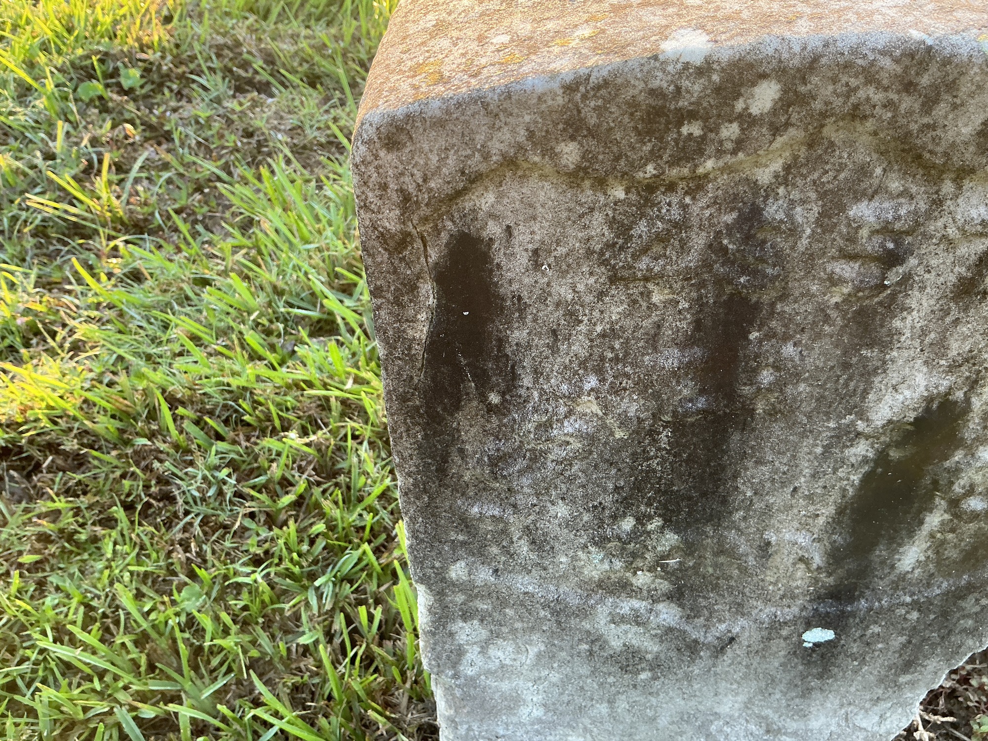 Extra image of historic upright marble headstone with recessed shield face.