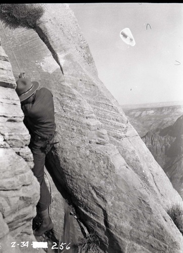 Crack where West Temple climb was made, close-up of ranger in crack.
