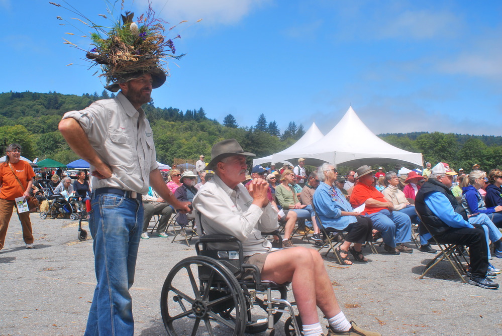 Two men in part of a crowd.