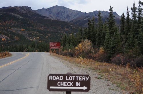 a wooden sign reading 