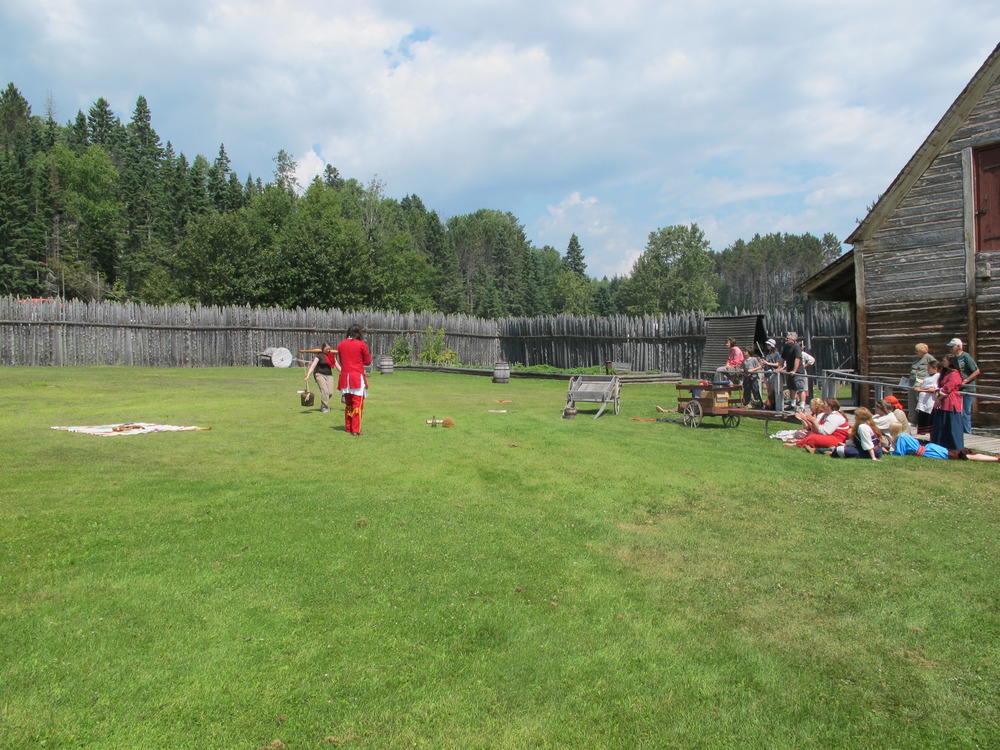 Rendezvous contest taking place on grass inside the stockade.