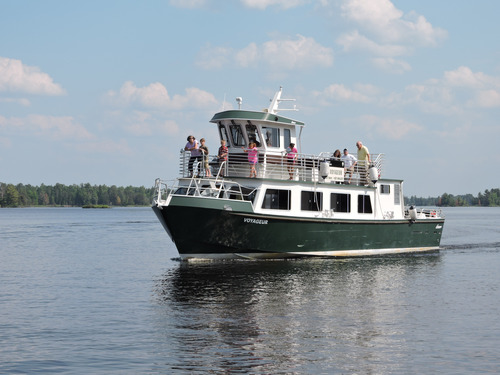Tour boat on a lake in Voyageurs National Park