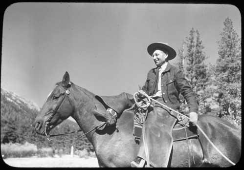 District Ranger Carl Danner on horse. Taken on the occasion of packing in the glacier survey party to Mt. Lyell. copied from a Kodachrom slide.