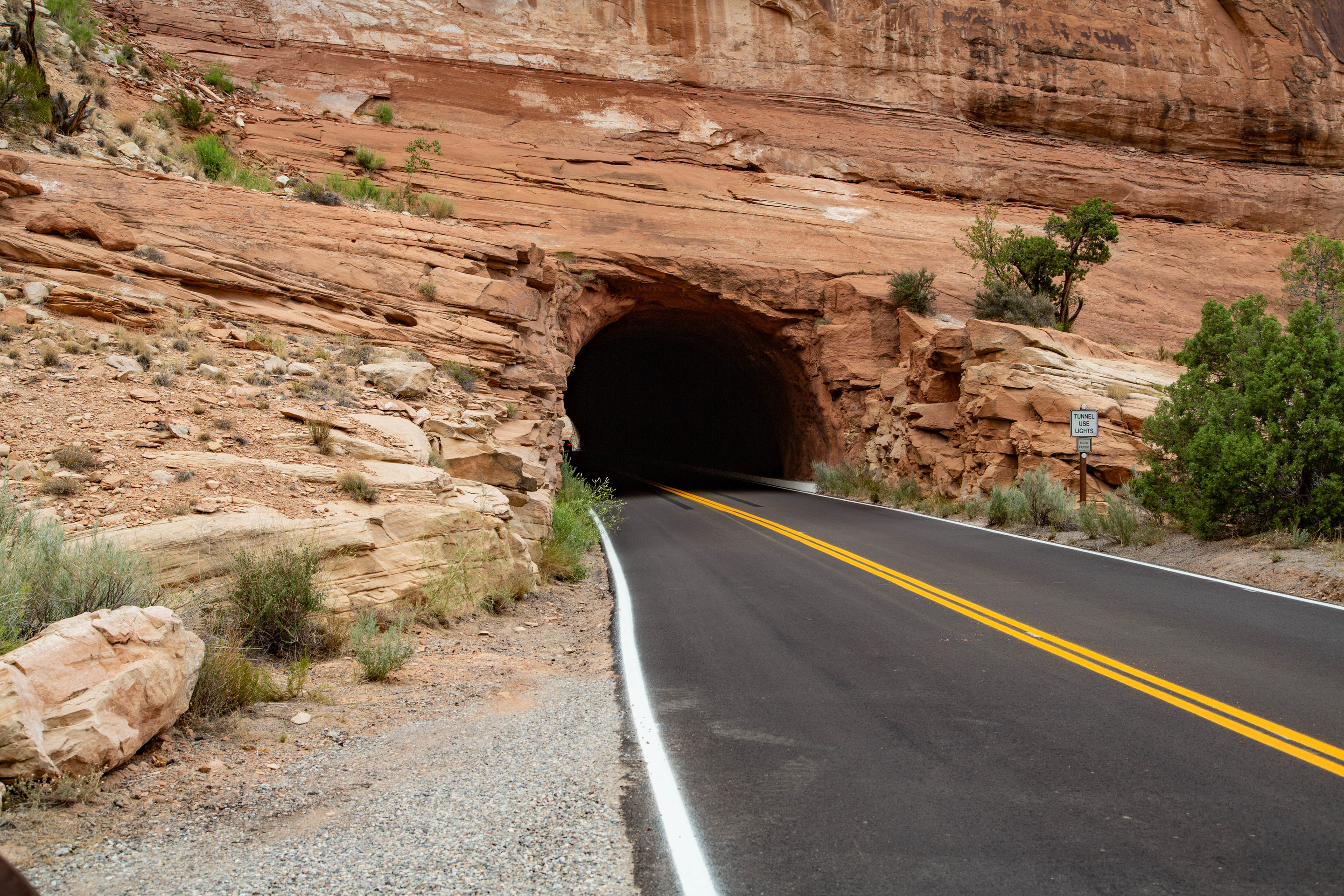 Tunnel and road through a canyon wall