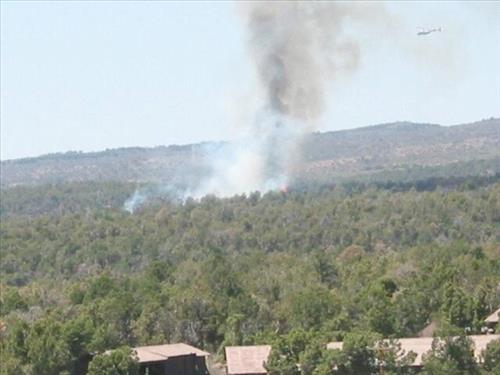 Photos of white smoke indicating start of the fire on the first day of Long Mesa Fire, Mesa Verde National Park, July 29, 2002