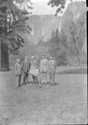 At site of future Ahwahnee Hotel: L-R: 1.? 2. Secty of Interior Hubert Work. 3. NPS Dir. Stephen T. Mather, 4. Donald Tresidder, 5. Bob Williams