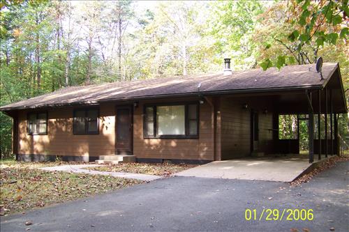 Repair insect/woodpecker damage on Quarters 3 at Prince William Forest Park in September 2009