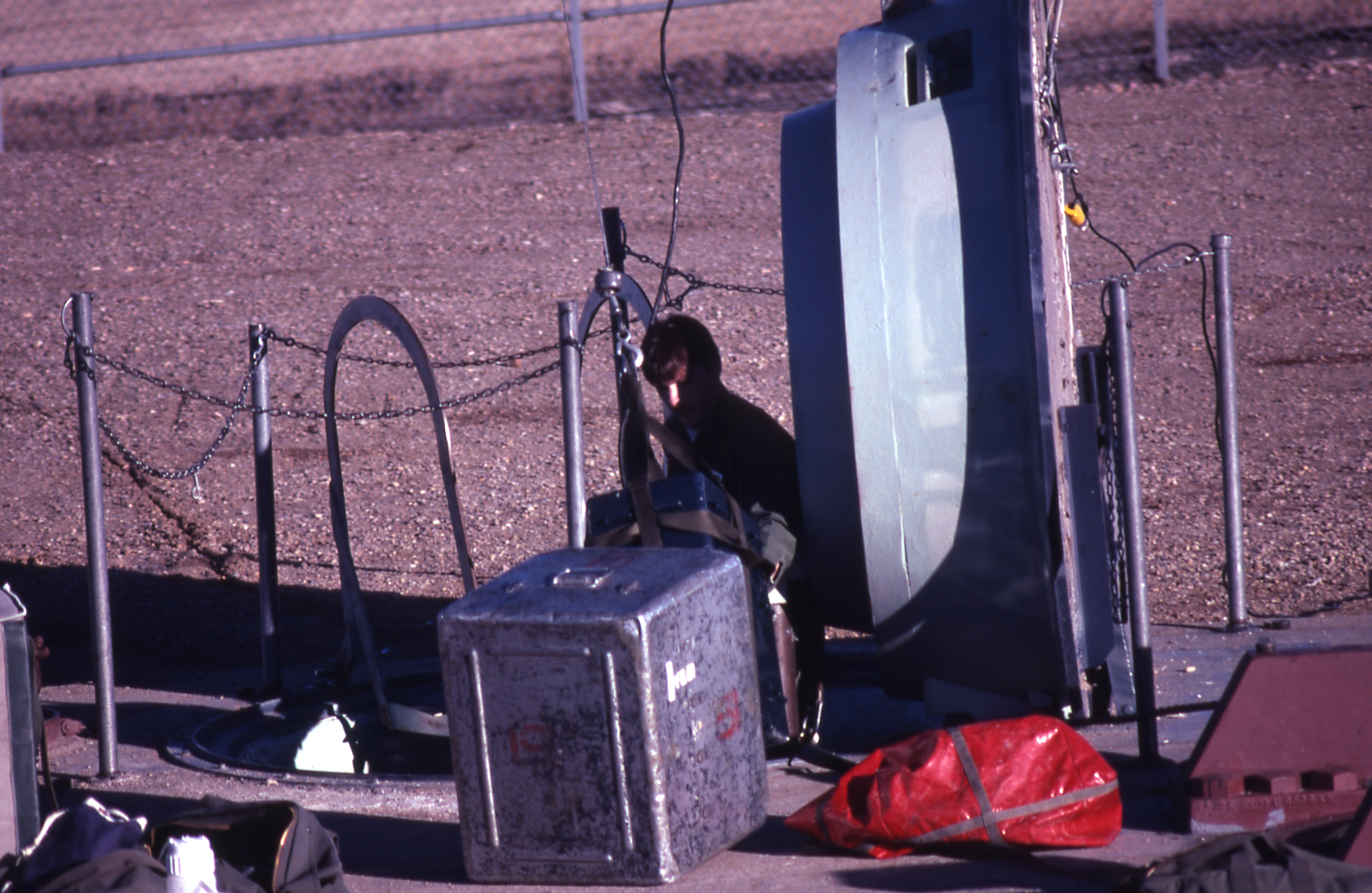 A1C Brad Johnson preparing to lower draft shield 