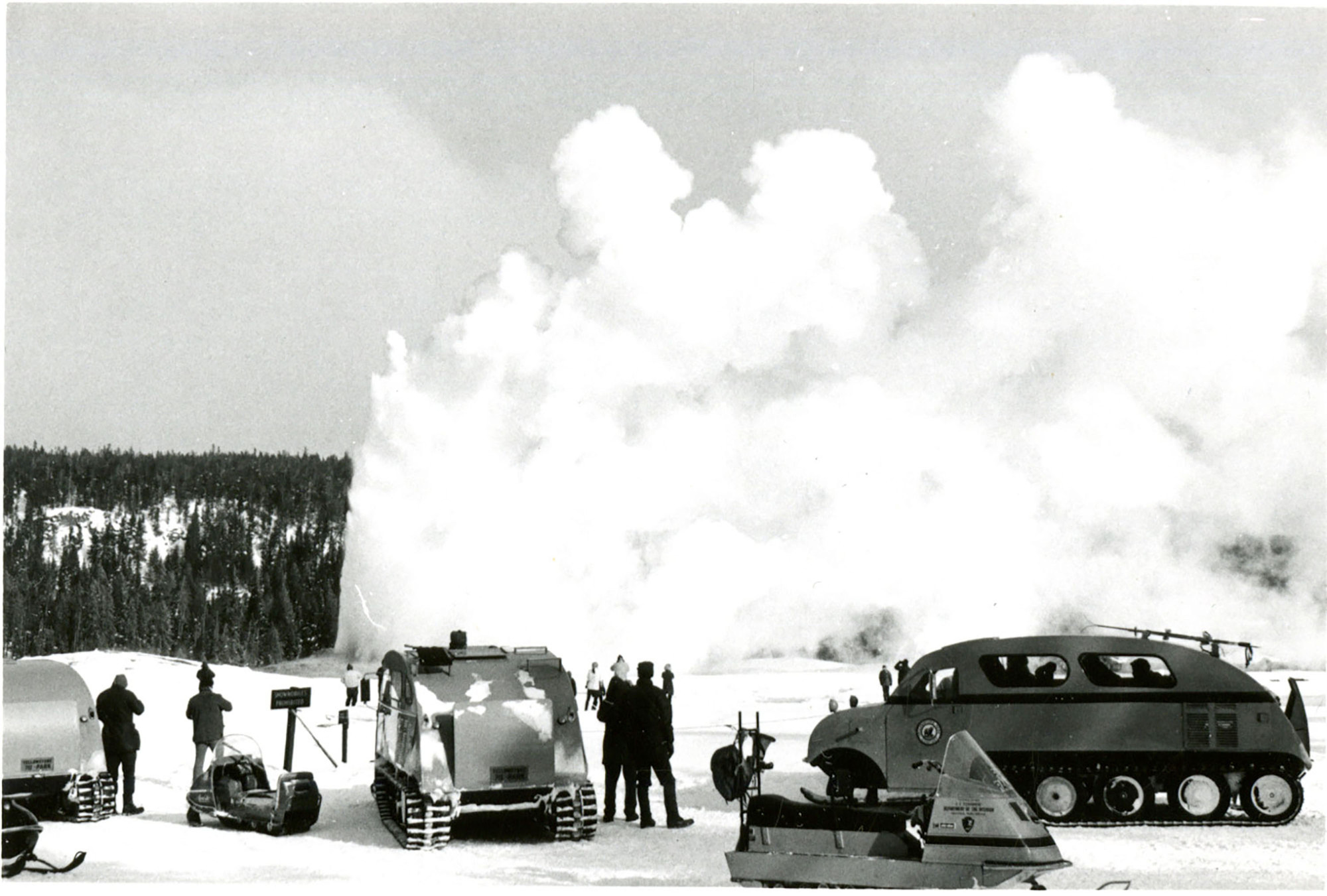 (Watching Old Faithful eruption in winter)