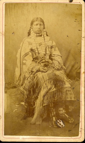 Tasey in a Richly Decorated Dress